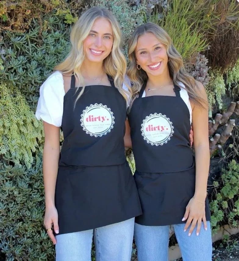 Delainee and Madison in their Dirty aprons